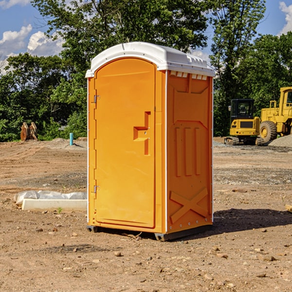 how often are the portable restrooms cleaned and serviced during a rental period in Manning Oregon